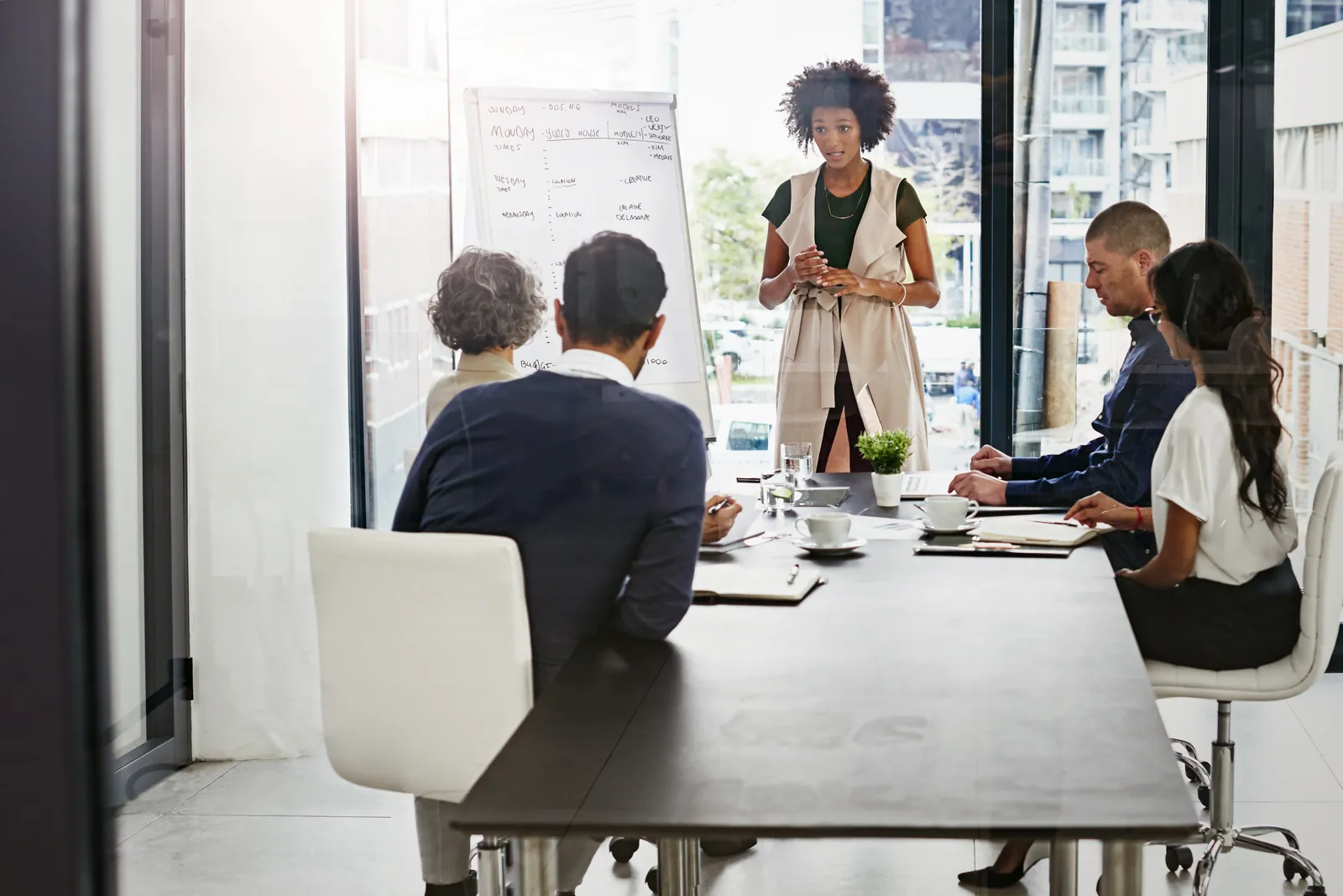A governance briefing at an office conference table